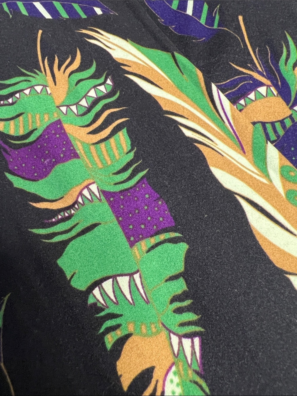 LuLaRoe Black Feather Print Leggings with Green, Purple & Gold Accents - Picture 2 of 5